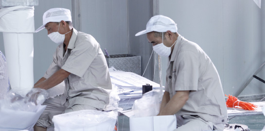 Men working in textile factory